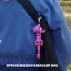 dragon clipped onto purse