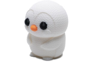 Knitted Baby Penguin figurine toy.