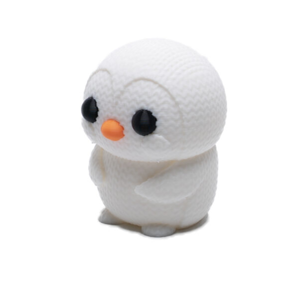 Knitted Baby Penguin figurine toy.