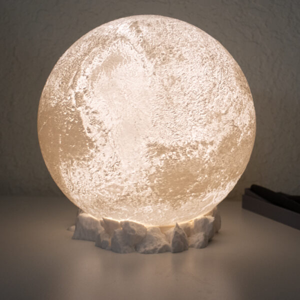 Pluto lithophane lamp. 8" diameter on a rocky terrain base.