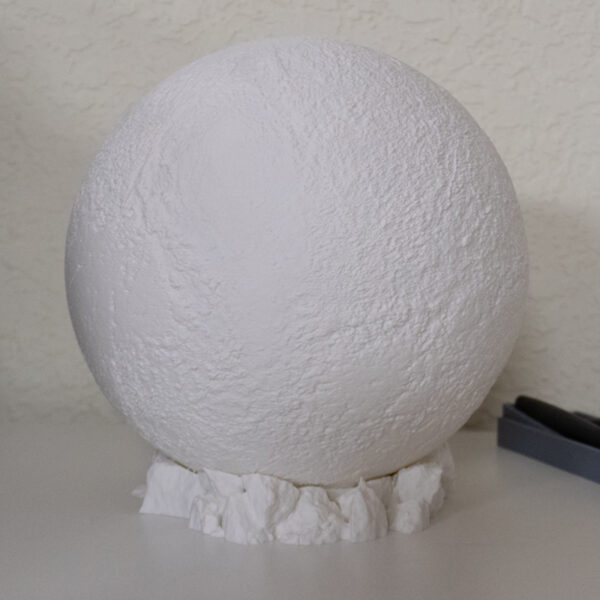 Pluto lithophane lamp. 8" diameter on a rocky terrain base.